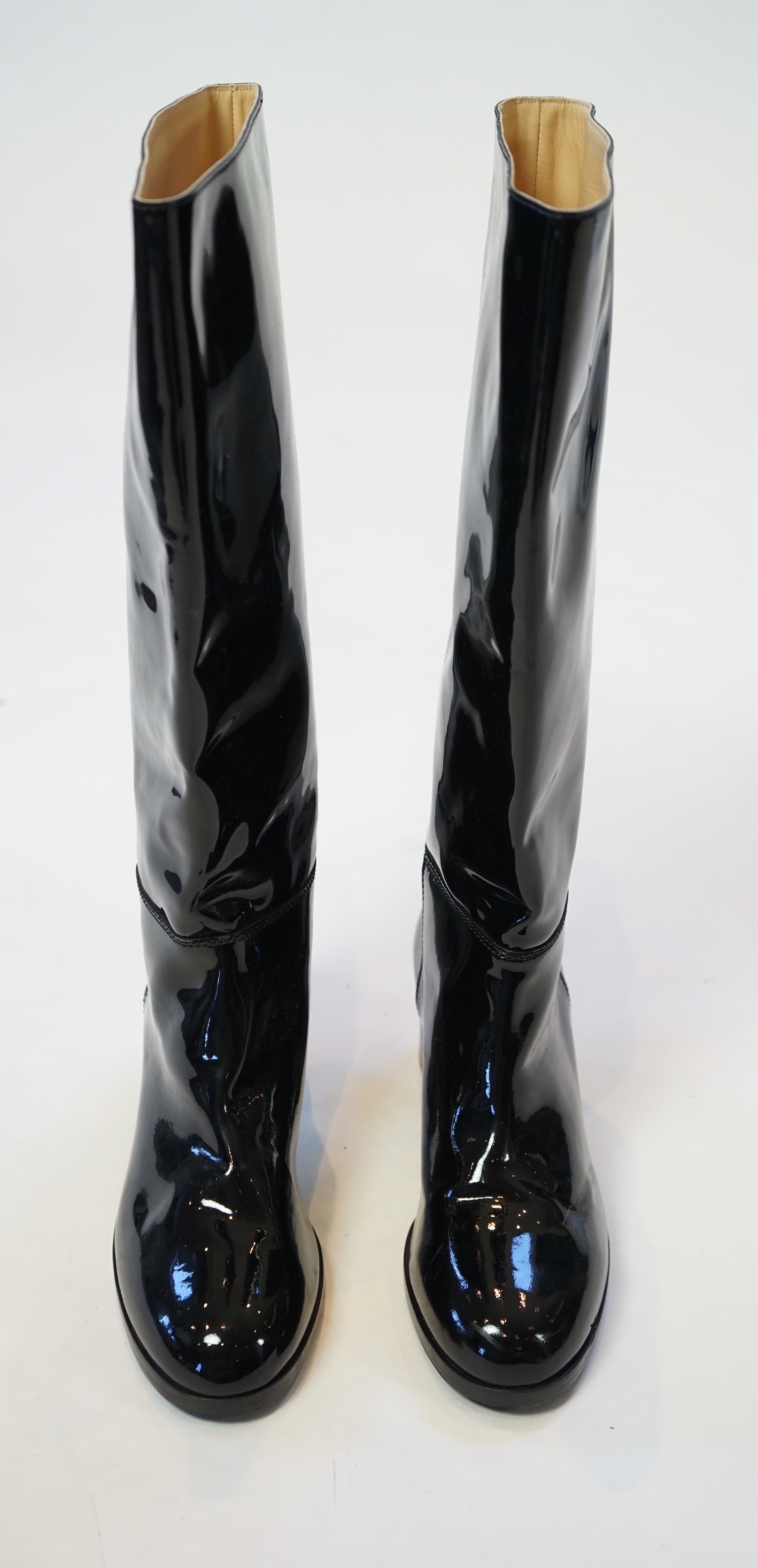 A pair of Chanel lady's black patent knee high mid heel rain boots, size EU 40.5